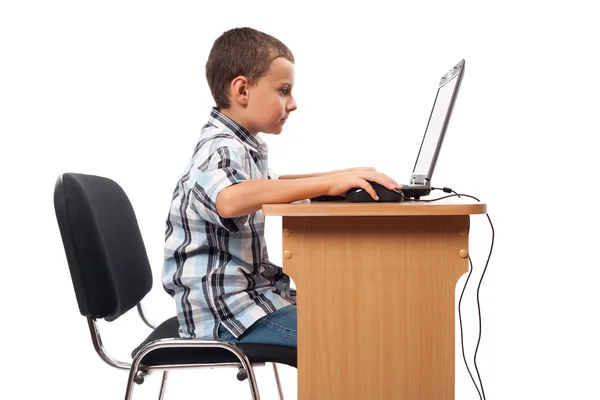 Criança moderna no computador portátil — Fotografia de Stock