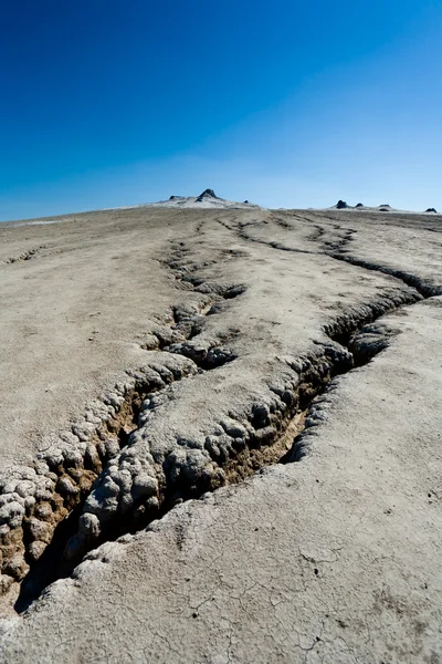 Cracked ground from muddy volcanoes in Romania — Stock Photo, Image
