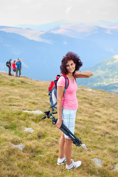 Attractive young lady outdoor in mountains — Stock Photo, Image