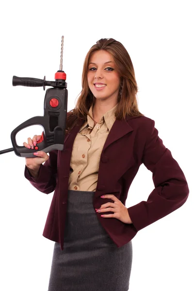 Concept image of a businesswoman with drilling machine — Stock Photo, Image