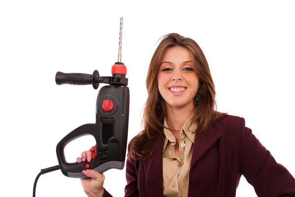 Imagem de conceito de uma mulher de negócios com máquina de perfuração — Fotografia de Stock