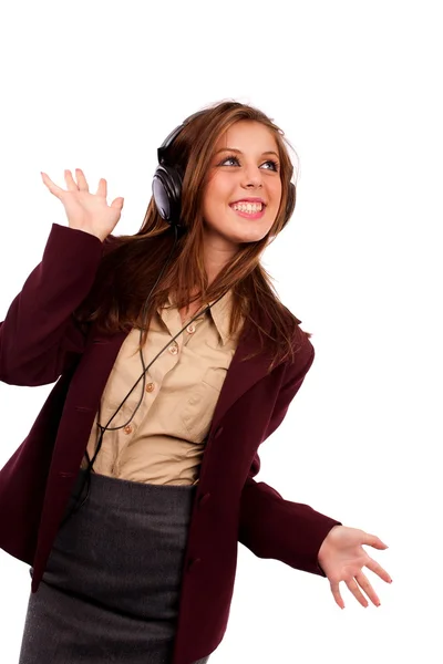 Jovem senhora de negócios com fones de ouvido — Fotografia de Stock