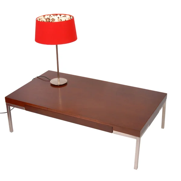 Lâmpada vermelha em uma mesa de café isolada — Fotografia de Stock
