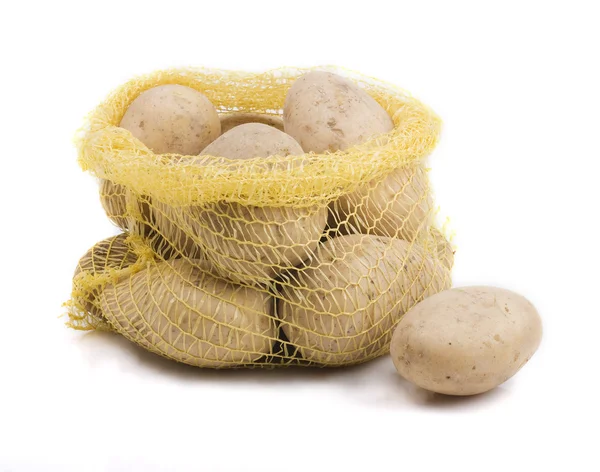 Sack with potatoes on white Stock Picture