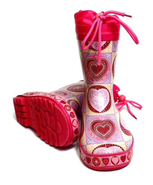 Rosa knä-gummistövlar för flicka — Stockfoto