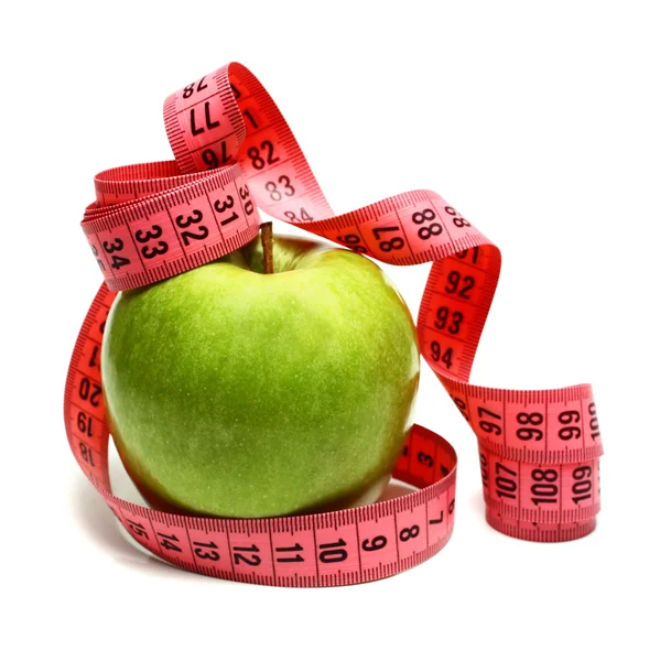 Measuring ribbon and apple for diet — Stock Photo, Image