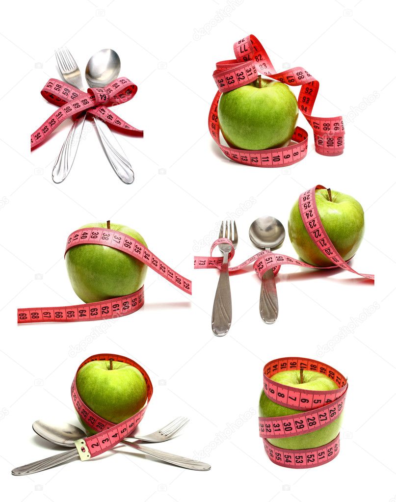 Spoon fork and apple is strung by a ribbon for measuring diet