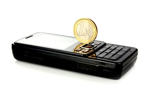 Mobile telephone and coin 1 euro — Stock Photo, Image