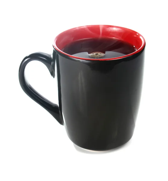 Le café est dans une tasse noire — Photo