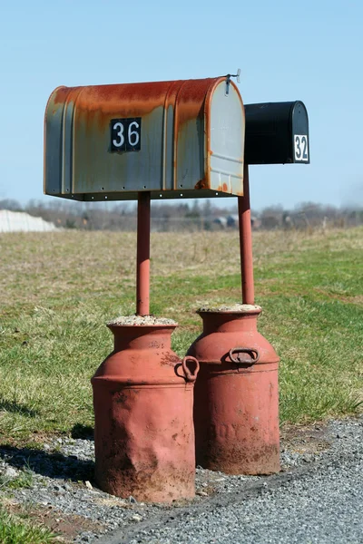 stock image Two Mailboxes with milk jug bases