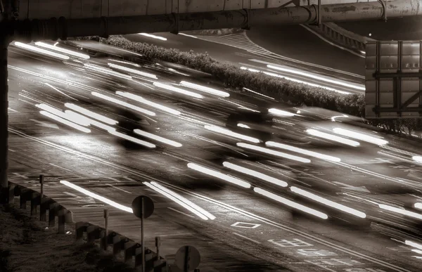 Tráfego de carros e luzes — Fotografia de Stock