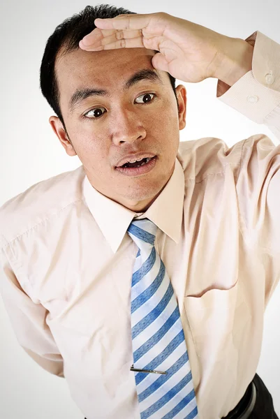 Asijské obchodní muž vzhled — Stock fotografie