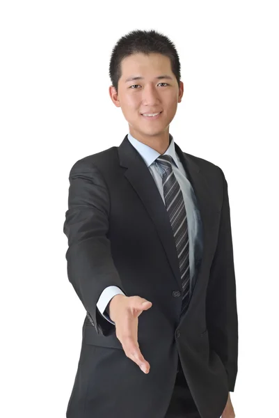 Jovem homem de negócios apertar a mão — Fotografia de Stock