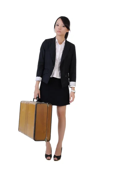 Single business girl holding old traveling case — Stock Photo, Image