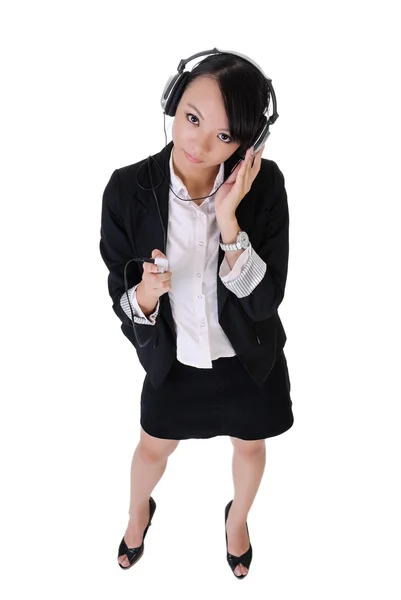Business kvinna lyssna musik — Stockfoto