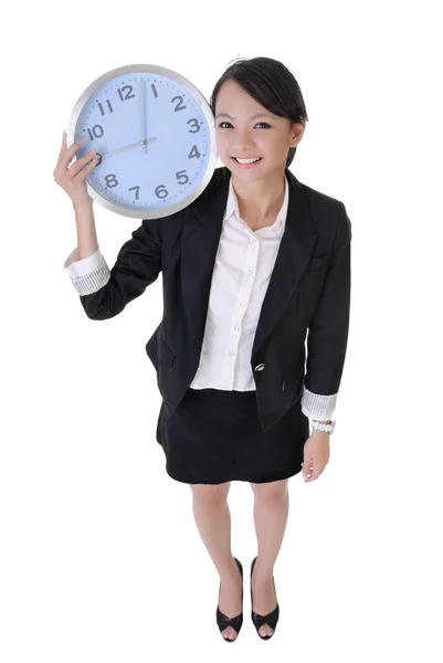 Feliz mujer de negocios sosteniendo reloj —  Fotos de Stock