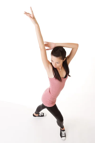 Moderne junge Frau tanzt Stockbild