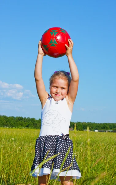 The little girl on the lawn — Stock Photo, Image