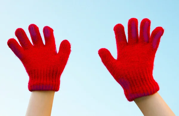 stock image Two hands dressed in gloves