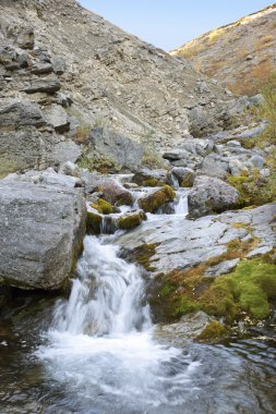 Stream with a waterfall clipart