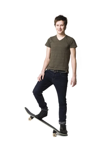 Homme avec un skateboard — Photo