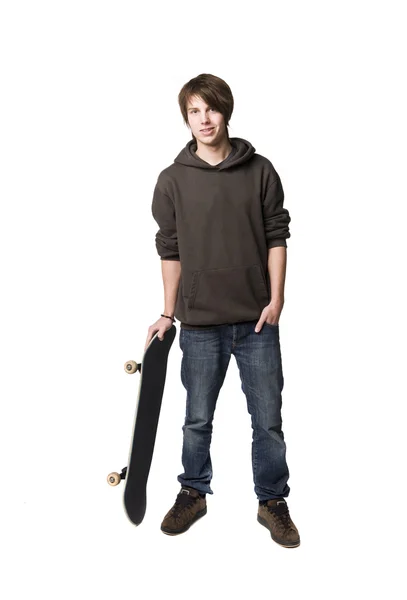 Jongen met een skateboard — Stockfoto