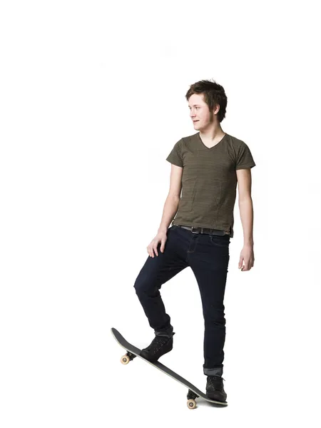 Pojke med skateboard — Stockfoto