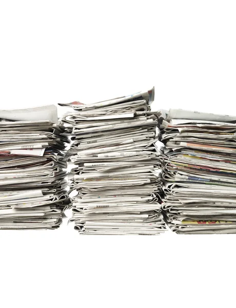 Three piles of newspapers — Stock Photo, Image