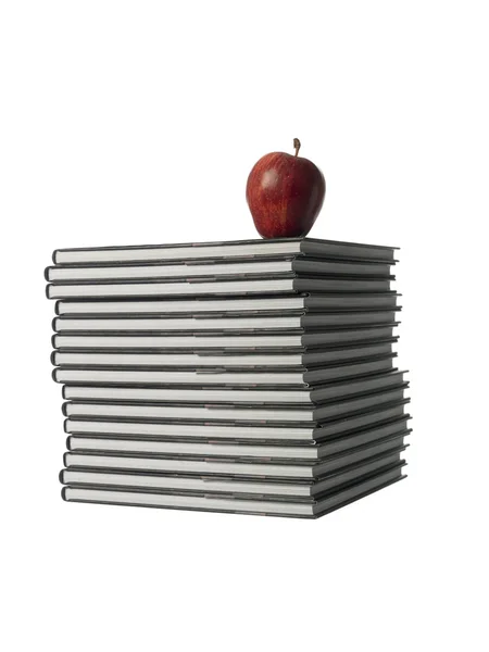 Книги з яблуком — стокове фото