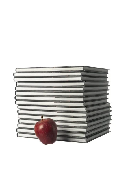 Bir elma ile kitapları — Stok fotoğraf
