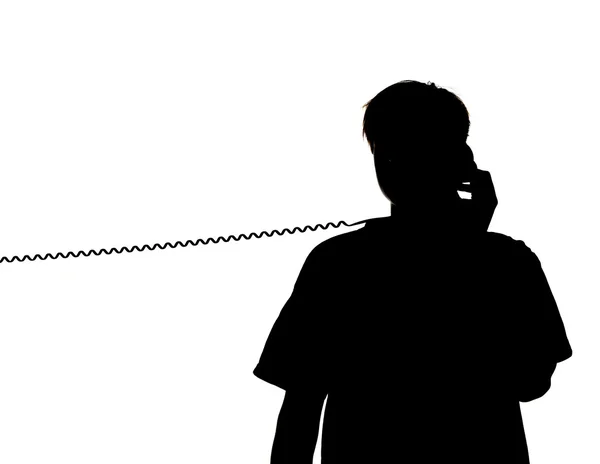 Een jongen aan de telefoon — Stockfoto
