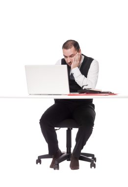 Tired man behind a desk clipart