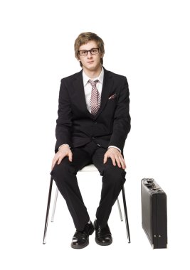 Man siting on a chair clipart