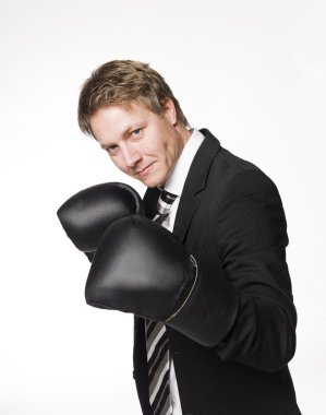Buisnessman in boxinggloves clipart