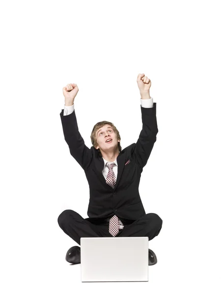 Homem feliz com um computador — Fotografia de Stock