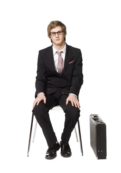 Muž sedící na židli — Stock fotografie