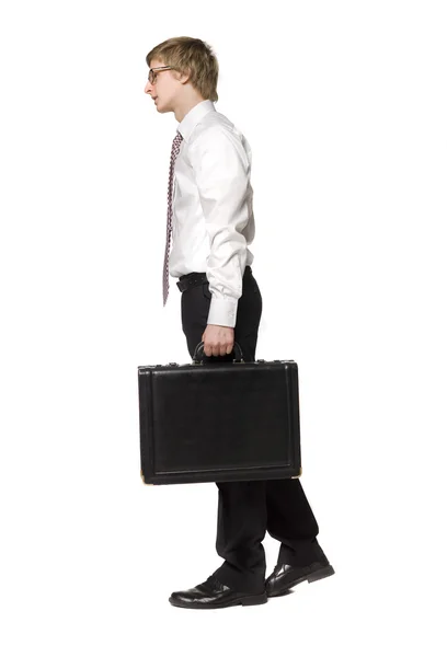 Bir evrak çantası ile yürüyen adam — Stok fotoğraf