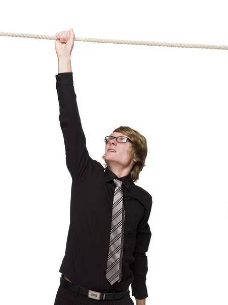 Hombre colgado en una cuerda — Foto de Stock