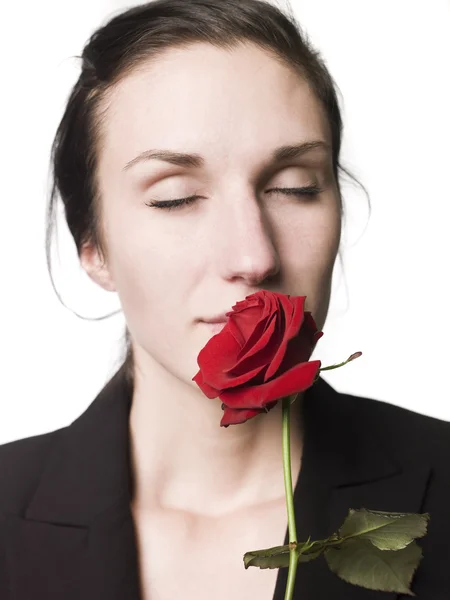 Жінка пахне трояндою — стокове фото