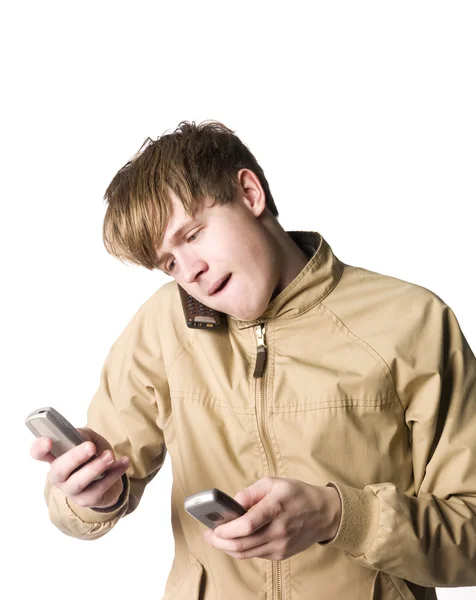 Mann mit drei Mobiltelefonen — Stockfoto