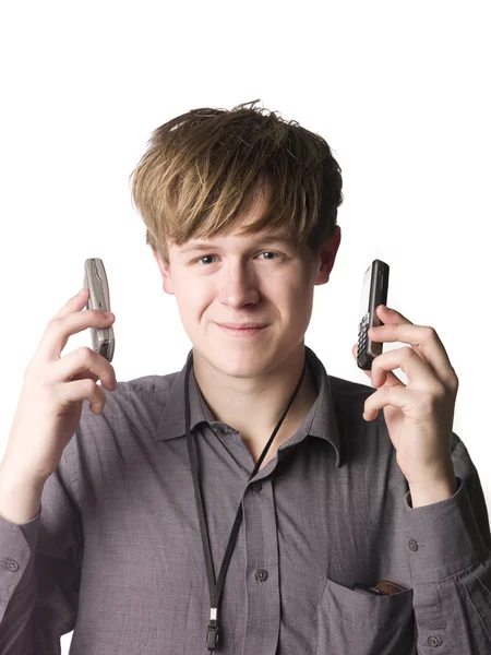 Man met twee mobiele telefoons — Stockfoto