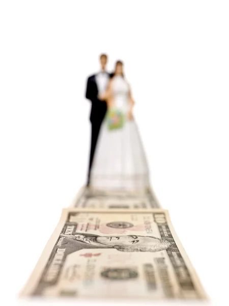 Bruiloft paar voor een dollar bank — Stockfoto