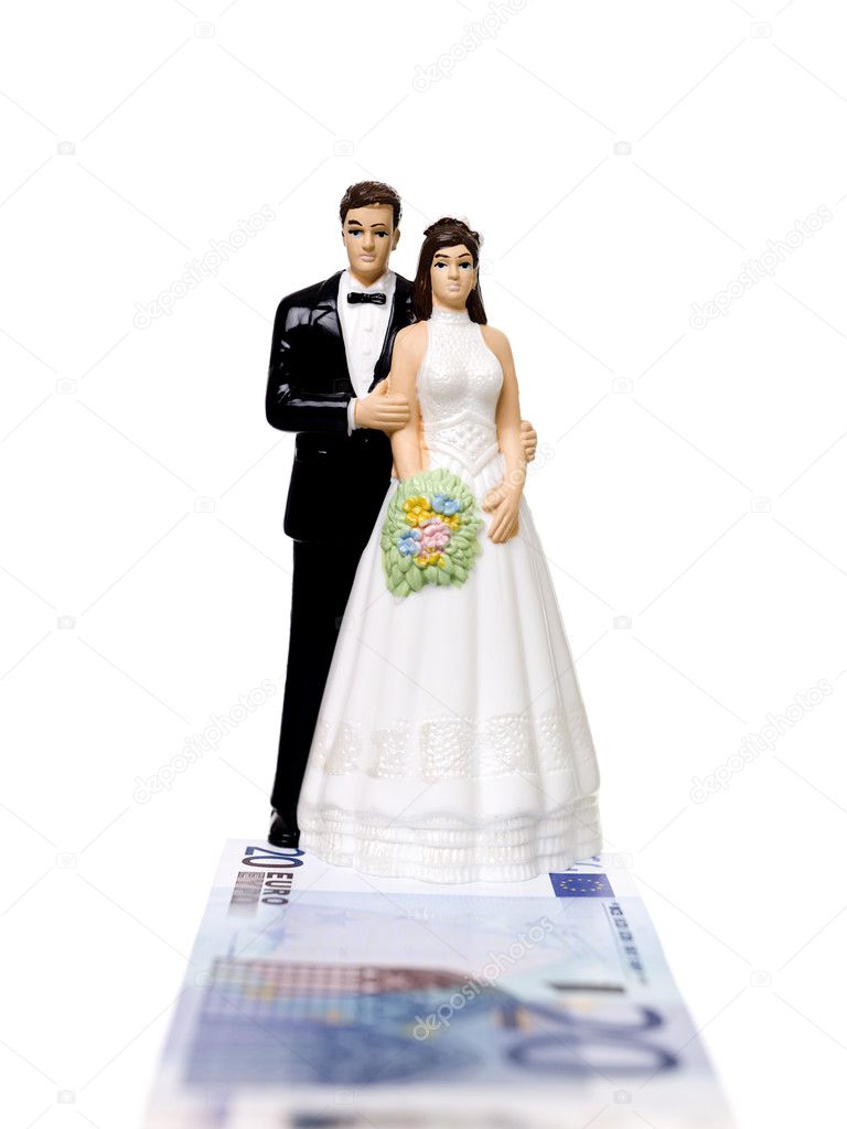 Wedding Couple standing on a Euro Bank N