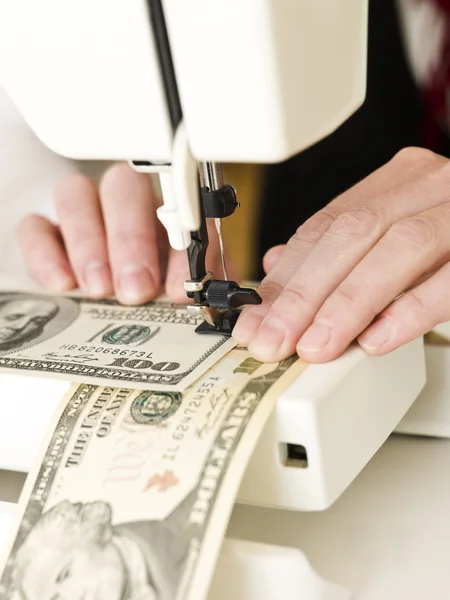 Sewing a dollar bank note — Stock Photo, Image