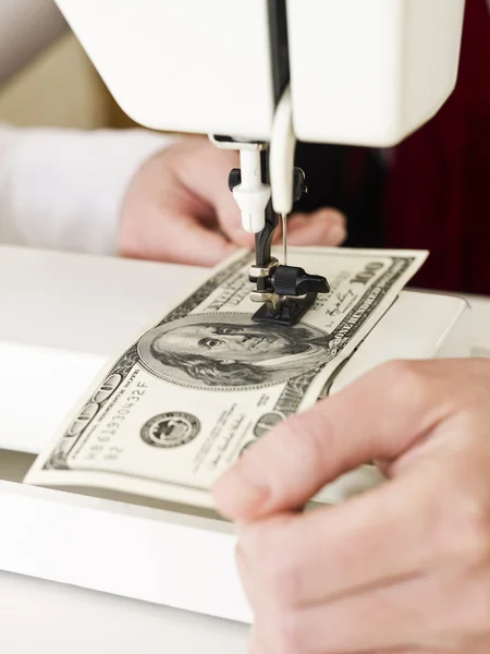Sewing money — Stock Photo, Image