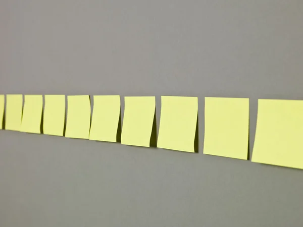 Adhesive Notes in a row — Stockfoto