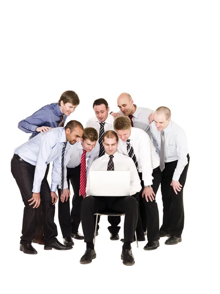 Empresarios frente a un portátil — Foto de Stock