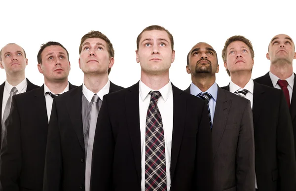 Confident team looking up — Stock Photo, Image
