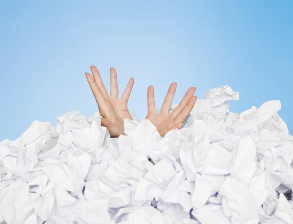Human buried in papers — Stockfoto