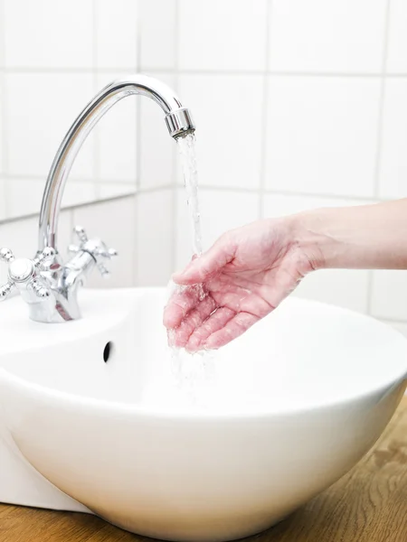 Mão e água — Fotografia de Stock
